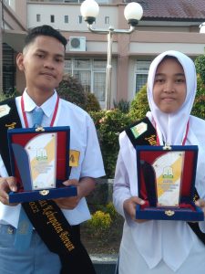 Faiz Nabil Fasya dan Ulfa Sahara SMAN 1 Bireun Juara Duta Kamtibmas Bireuen Tahun 2022
