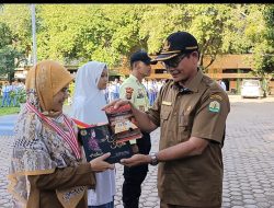 Megawati, S.Pd , M.M dan Billgis Ahsani Penyair ASEAN Peroleh Rakor MURI